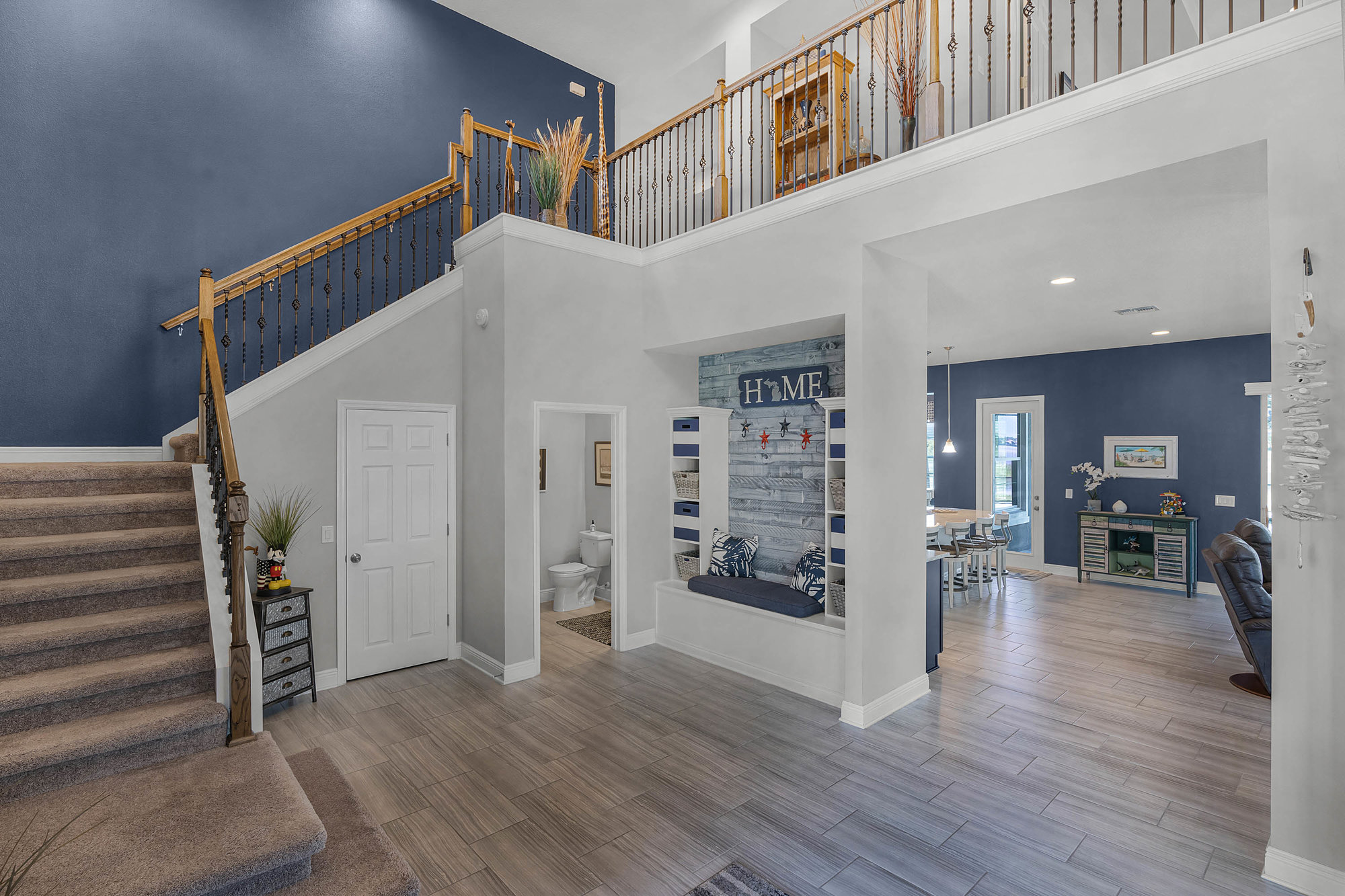 entryway with stairway and wood flooring